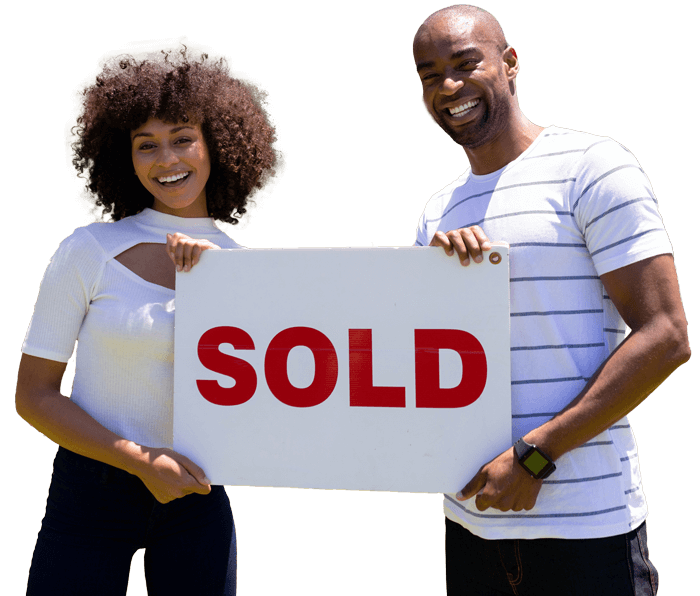 Happy homeowners after completing their home sale